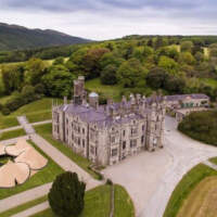 Six Tipis are joined together in a doughnut formation in front of Narrow Water Castle, County Down, Northern Ireland