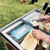 Ice cream is served out of a freezer trolley