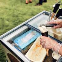 Ice cream is served out of a freezer trolley