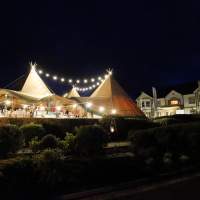 The Dubai Duty Free Tipi's are lit up with festoon lights at night